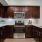 a kitchen with wooden cabinets
