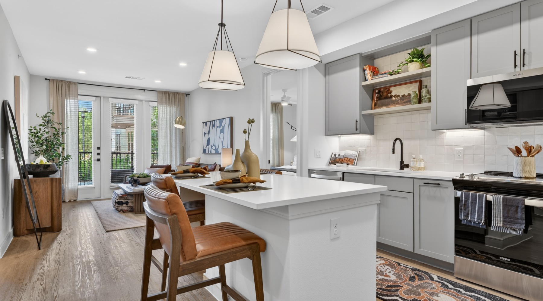 Kitchen with island and living room