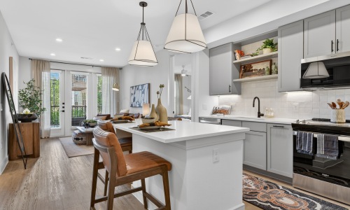 Kitchen with island and living room