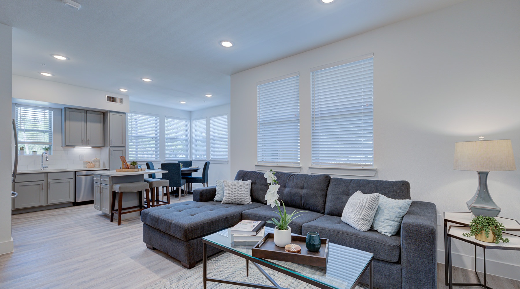 Settle into comfort at Tobin Estate furnished living room with windows