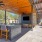 a patio with chairs and tables