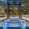 a swimming pool with a covered area
